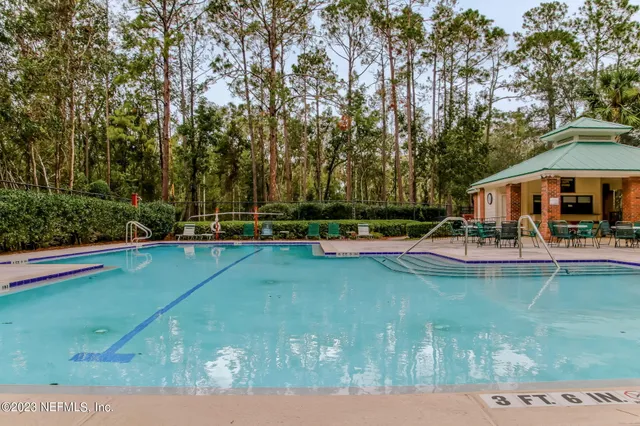 a view of a garden with a lake