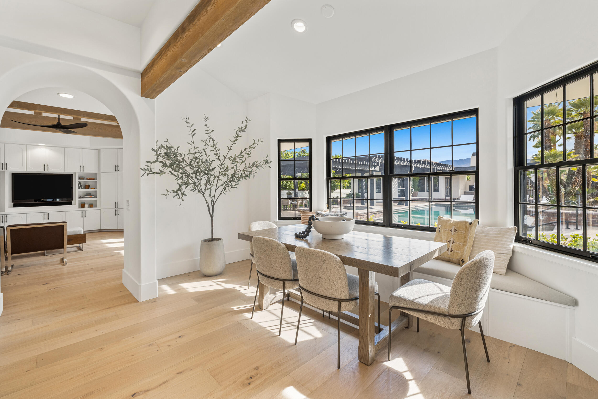 72420 Silver Spur Lane Rancho Mirage, CA 92270 - Photo 14 of 86 a dining room with furniture and large windows