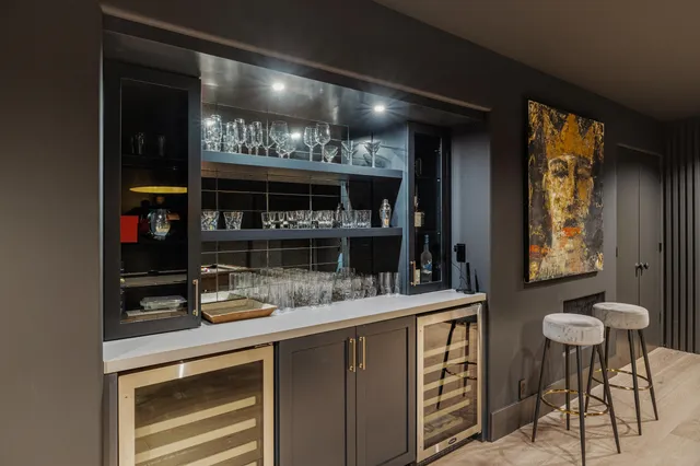 a dining room with furniture and a garden