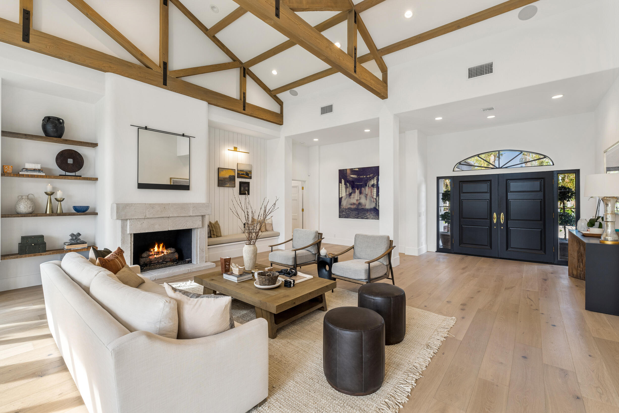 72420 Silver Spur Lane Rancho Mirage, CA 92270 - Photo 45 of 86 a living room with furniture a fireplace and a ceiling fan