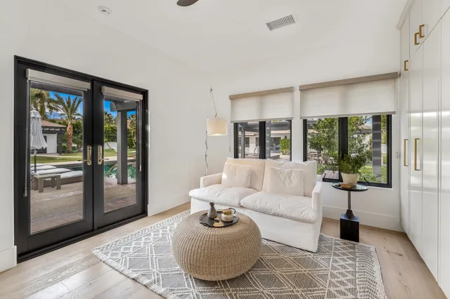 a view of swimming pool with outdoor seating and yard