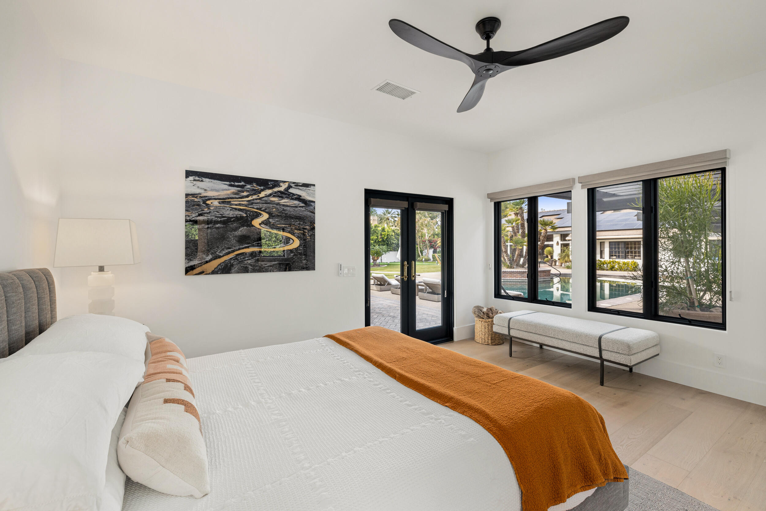 72420 Silver Spur Lane Rancho Mirage, CA 92270 - Photo 53 of 86 a bedroom with a large bed and a large window