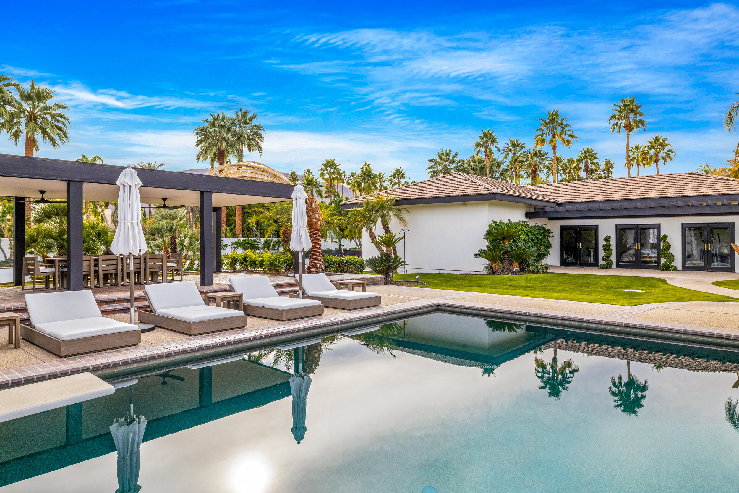 72420 Silver Spur Lane Rancho Mirage, CA 92270 - Photo 71 of 86 a view of a house with swimming pool and sitting area