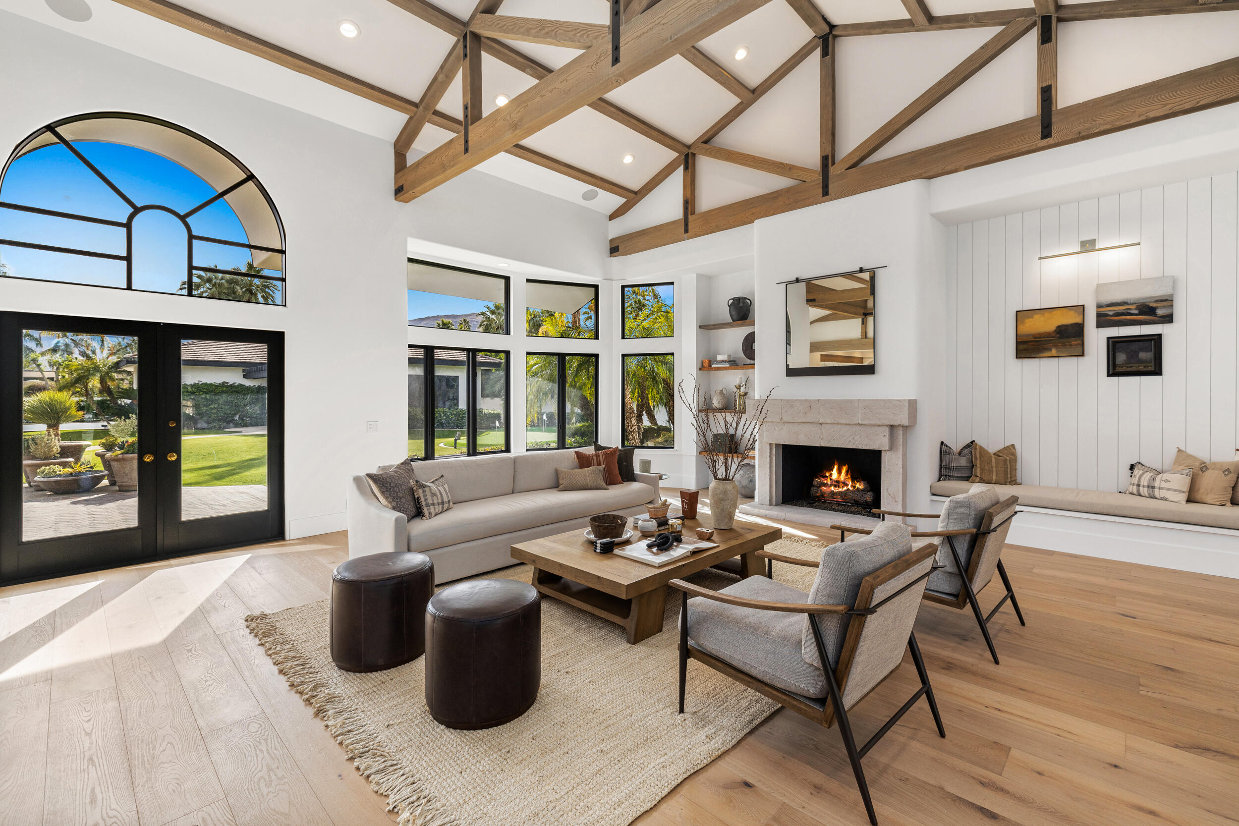72420 Silver Spur Lane Rancho Mirage, CA 92270 - Photo 8 of 86 a living room with furniture a fireplace and a flat screen tv