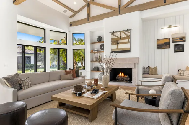 a kitchen with stainless steel appliances granite countertop white cabinets and a granite counter tops