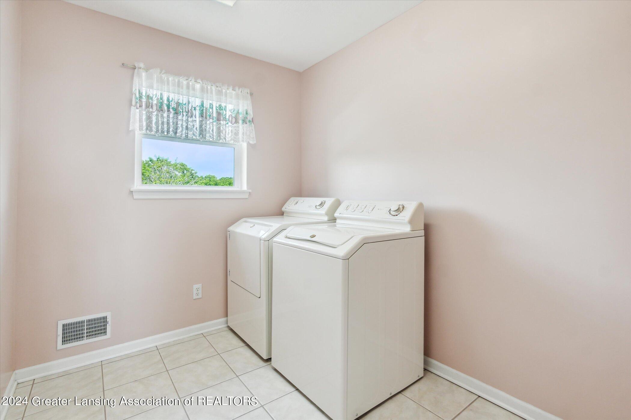 12550 Watson Road Bath, MI 48808 - Photo 36 of 76 2nd Floor Laundry Room