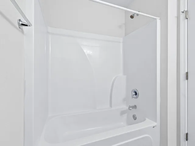 a view of a room with a bathroom