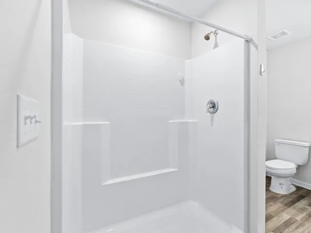 a view of a house with a swimming pool and a garden