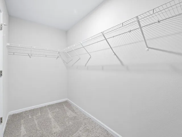 an aerial view of a house with swimming pool