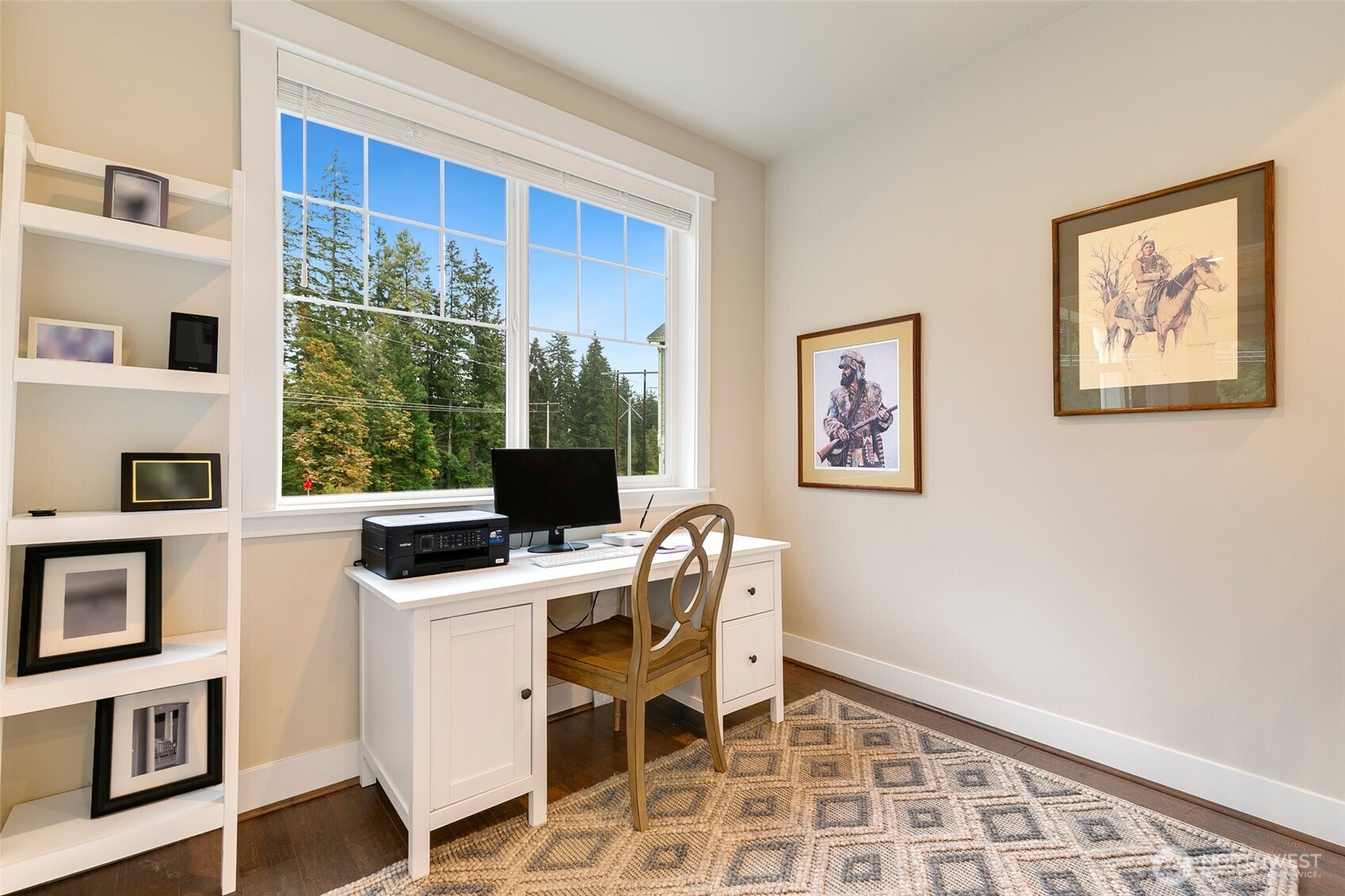 4612 186th Place Southeast, Unit A Bothell, WA 98012 - Photo 11 of 39 a view of a workspace with furniture and a window