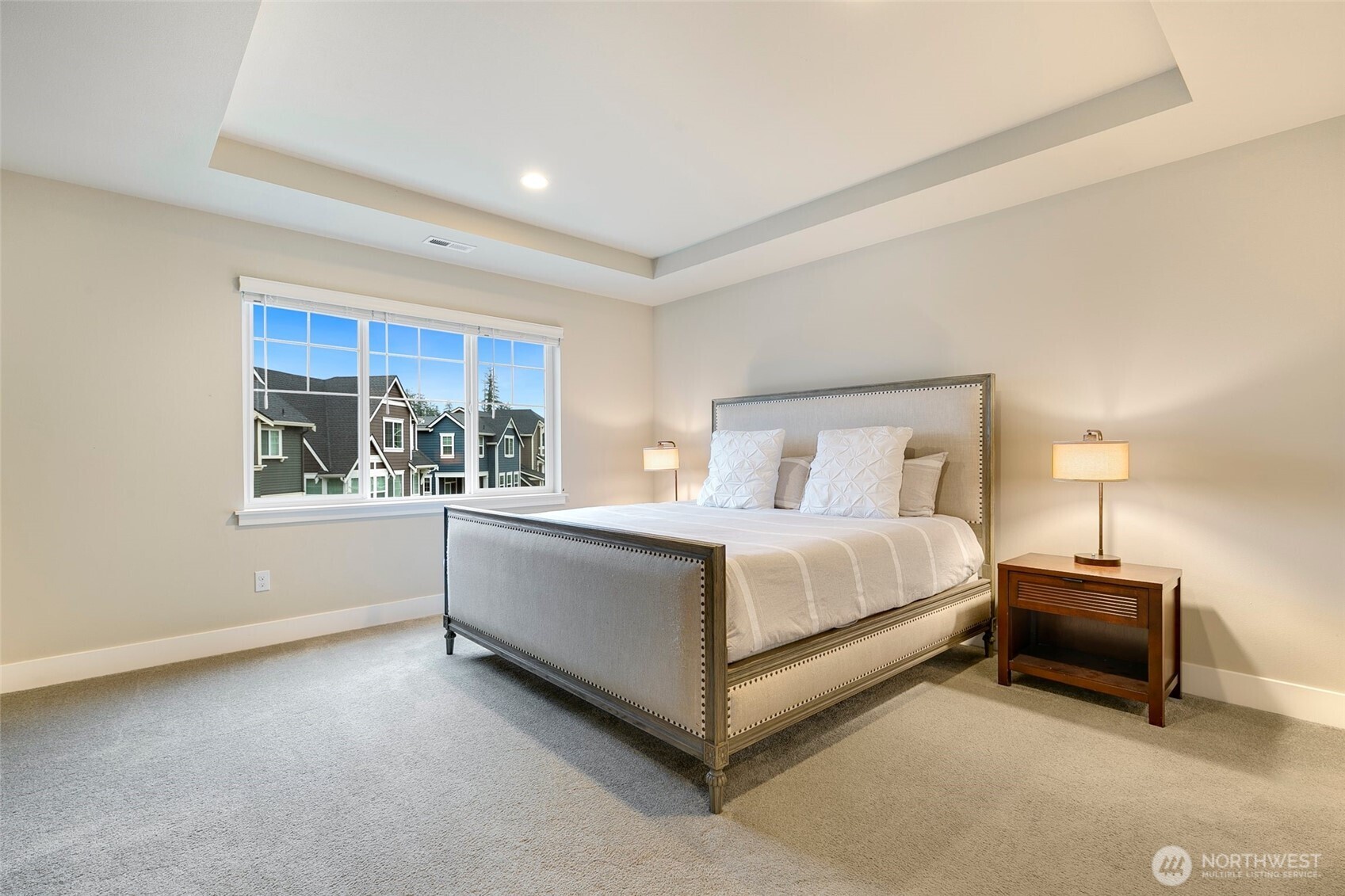 4612 186th Place Southeast, Unit A Bothell, WA 98012 - Photo 15 of 39 a bed room with a bed and a window