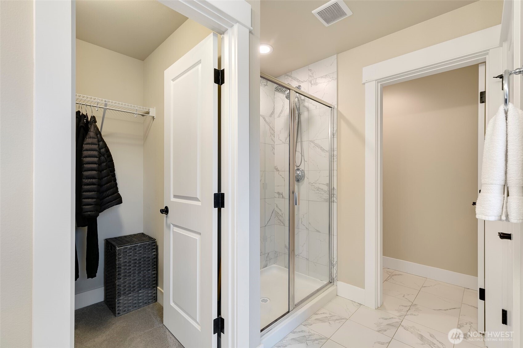 4612 186th Place Southeast, Unit A Bothell, WA 98012 - Photo 18 of 39 a bathroom with a glass door shower and a sink
