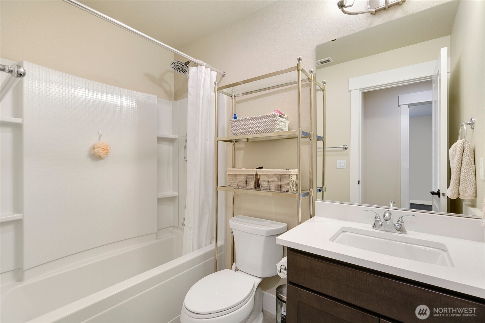 4612 186th Place Southeast, Unit A Bothell, WA 98012 - Photo 20 of 39 a bathroom with a sink toilet and shower