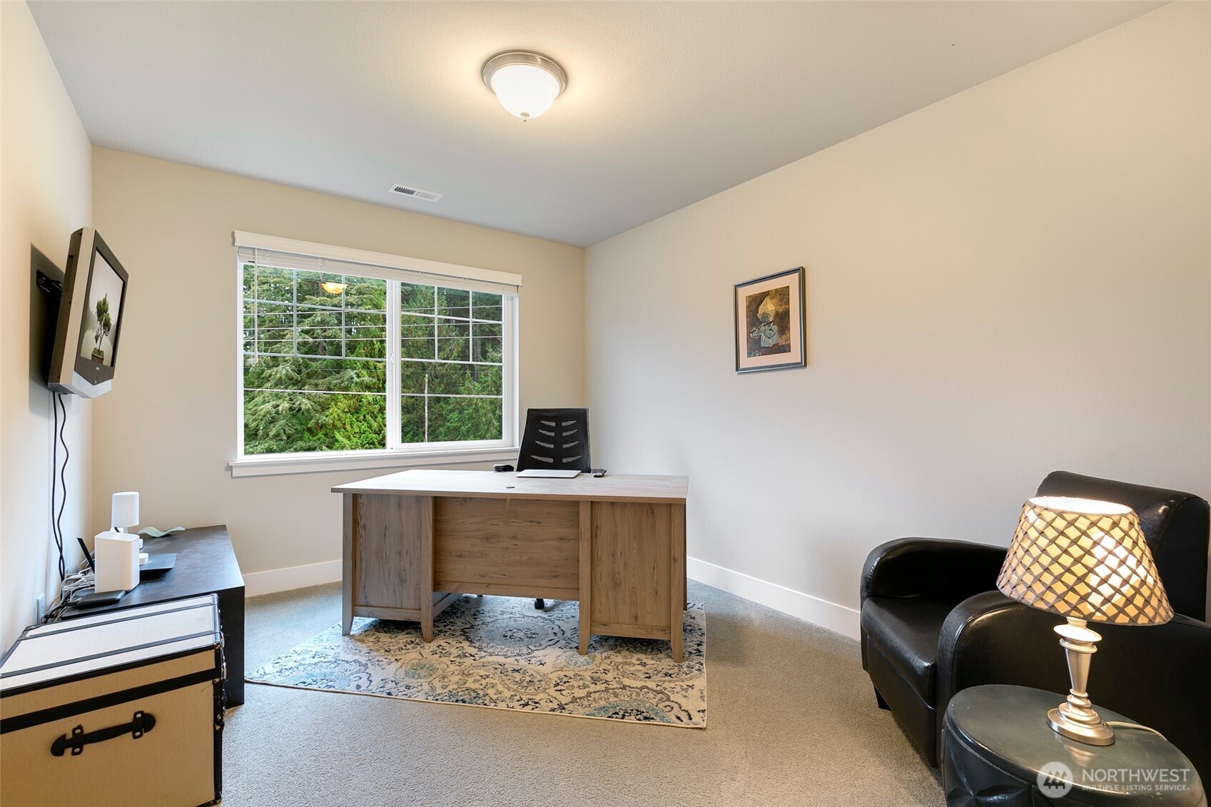 4612 186th Place Southeast, Unit A Bothell, WA 98012 - Photo 21 of 39 a work room with furniture and windows