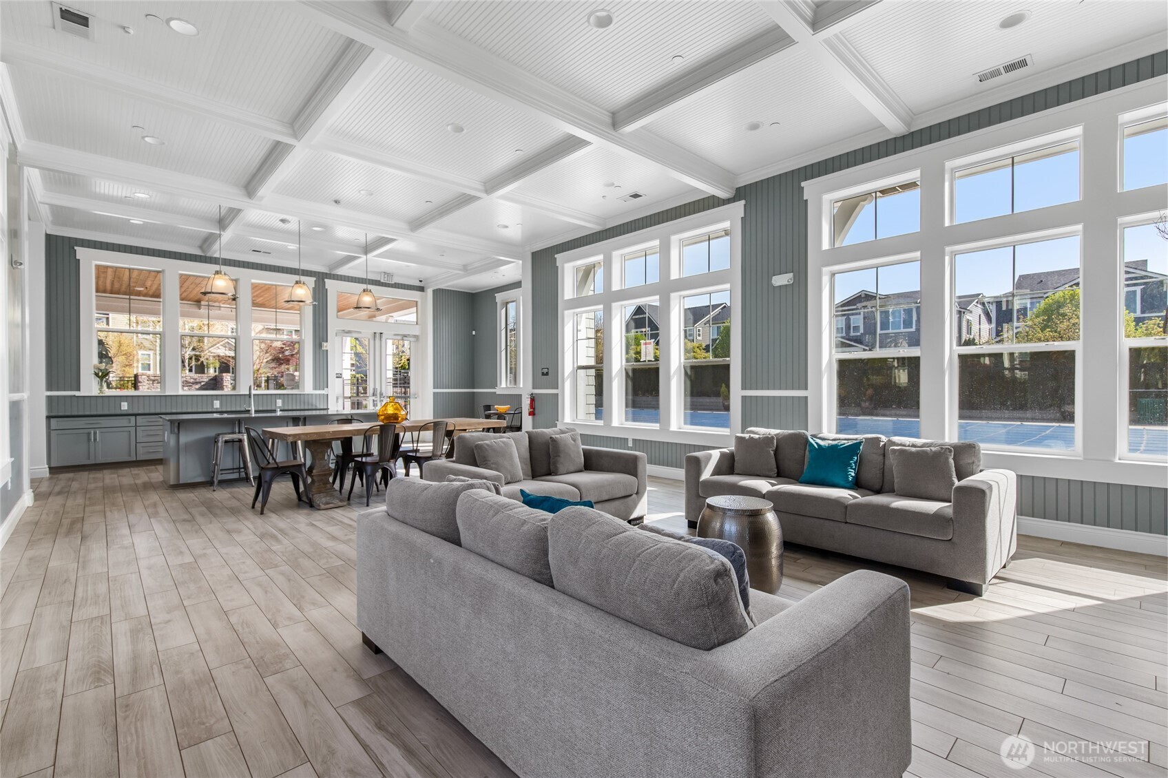 4612 186th Place Southeast, Unit A Bothell, WA 98012 - Photo 33 of 39 a living room with furniture and floor to ceiling windows