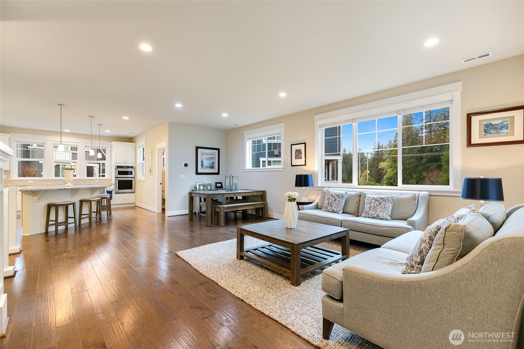 4612 186th Place Southeast, Unit A Bothell, WA 98012 - Photo 7 of 39 a living room with furniture and a table