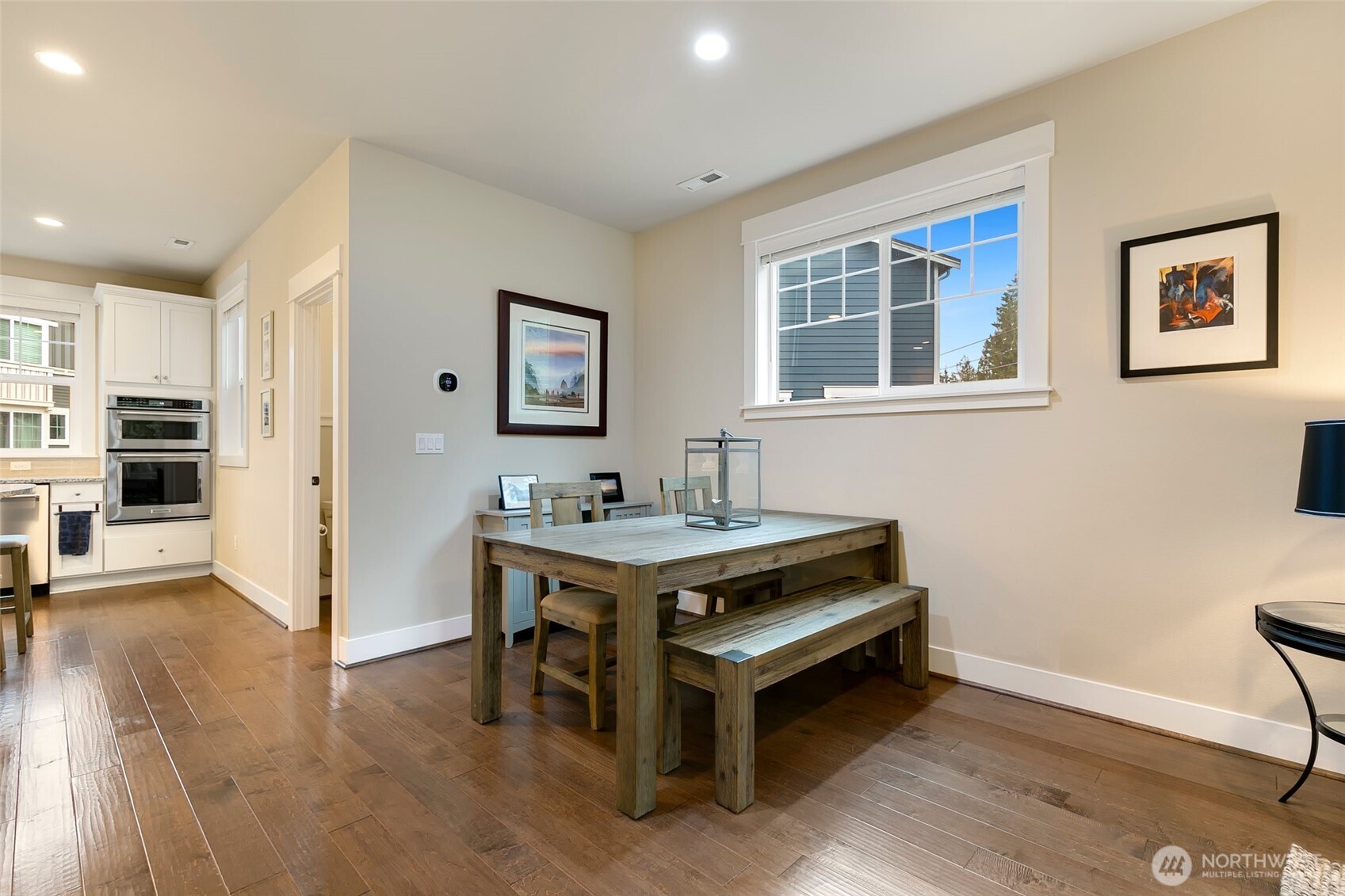 4612 186th Place Southeast, Unit A Bothell, WA 98012 - Photo 9 of 39 a room with furniture and a window
