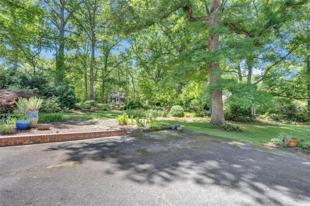 103 Gabriel Way Social Circle, GA 30025 - Photo 64 of 70 a view of a park with large trees