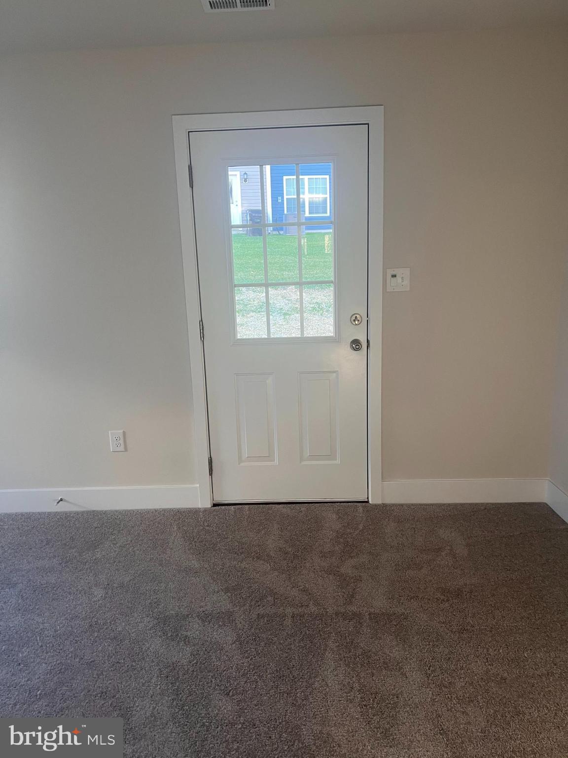 7551 Dundee Road Windsor Mill, MD 21244 - Photo 8 of 19 a view of an empty room with a window