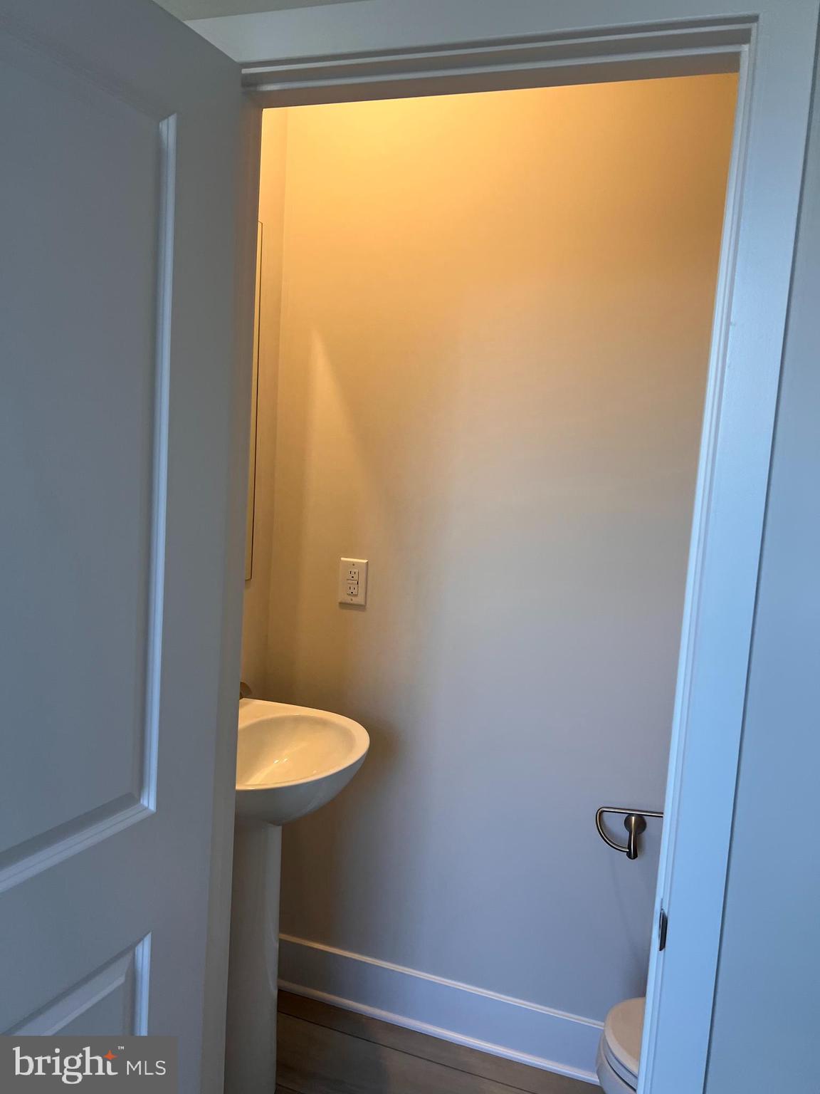 7551 Dundee Road Windsor Mill, MD 21244 - Photo 9 of 19 a bathroom with a sink