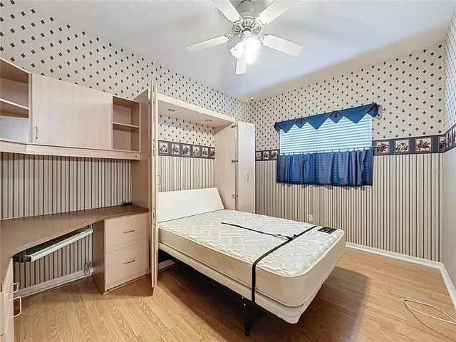 a view of a house with a back yard