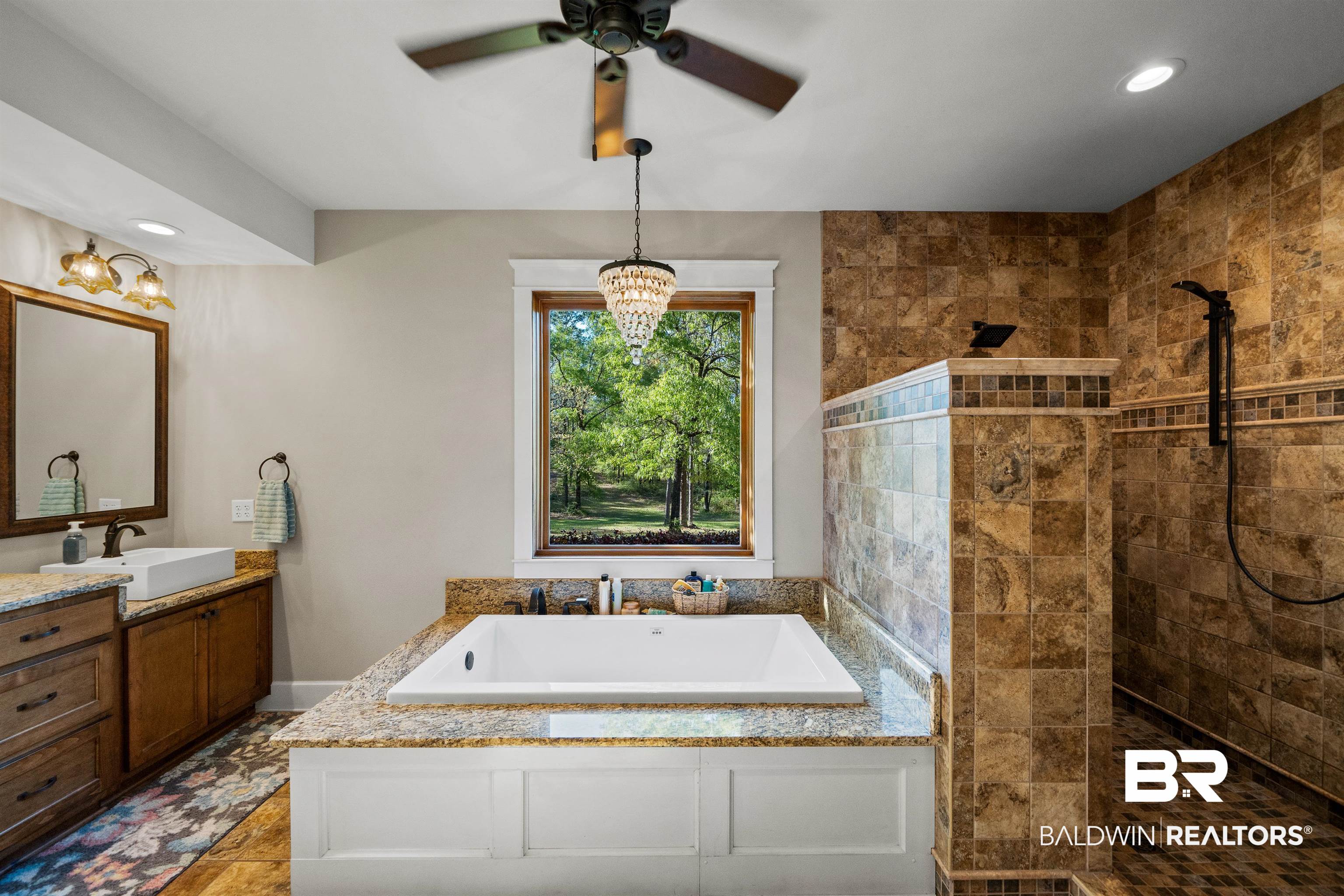 47252 Emmons Road Bay Minette, AL 36507 - Photo 22 of 50 Bathroom featuring a garden tub, walk in shower, recessed lighting, vanity, and a ceiling fan