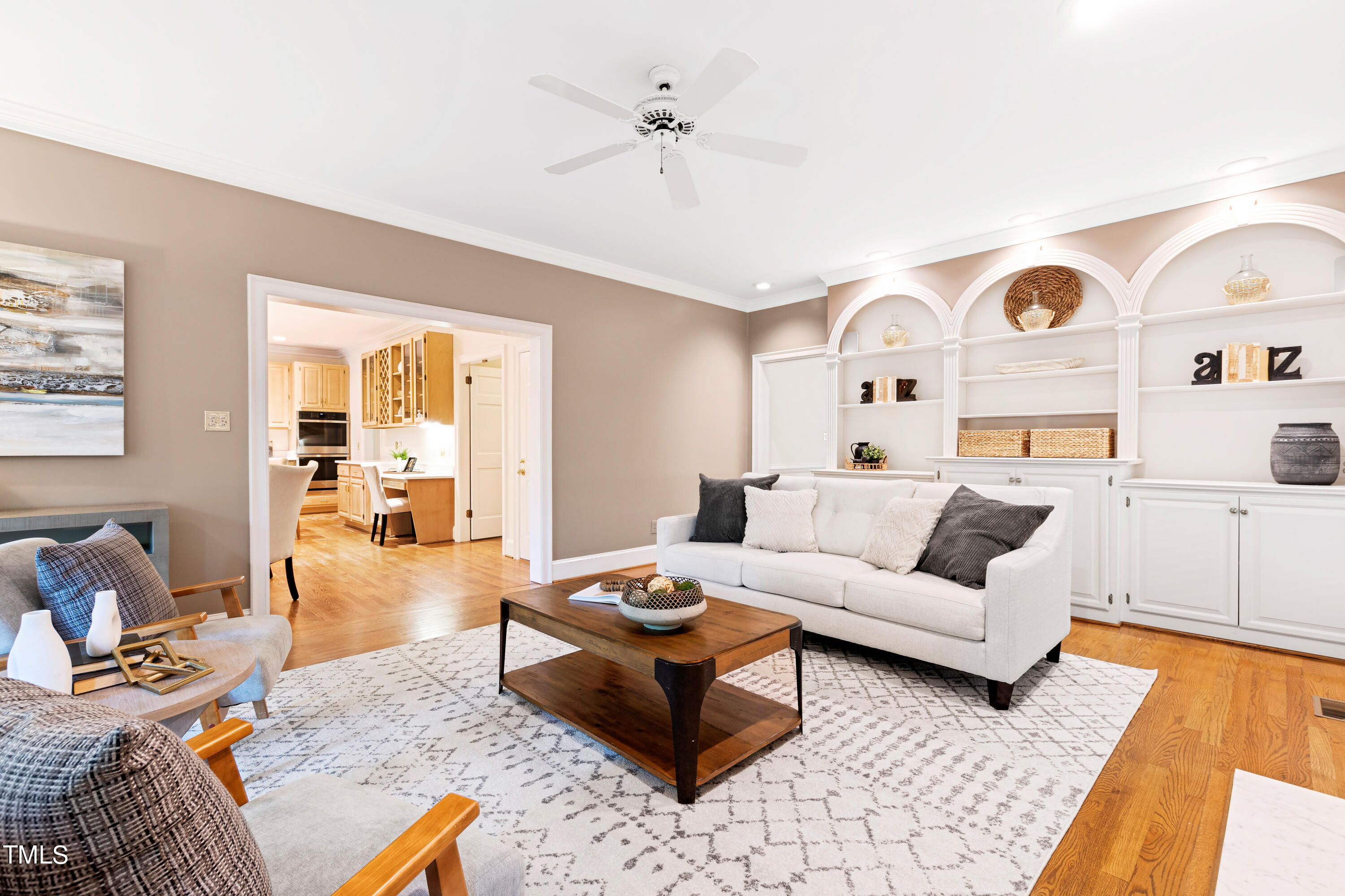 605 Chalfant Court Raleigh, NC 27607 - Photo 11 of 37 a living room with furniture and wooden floor