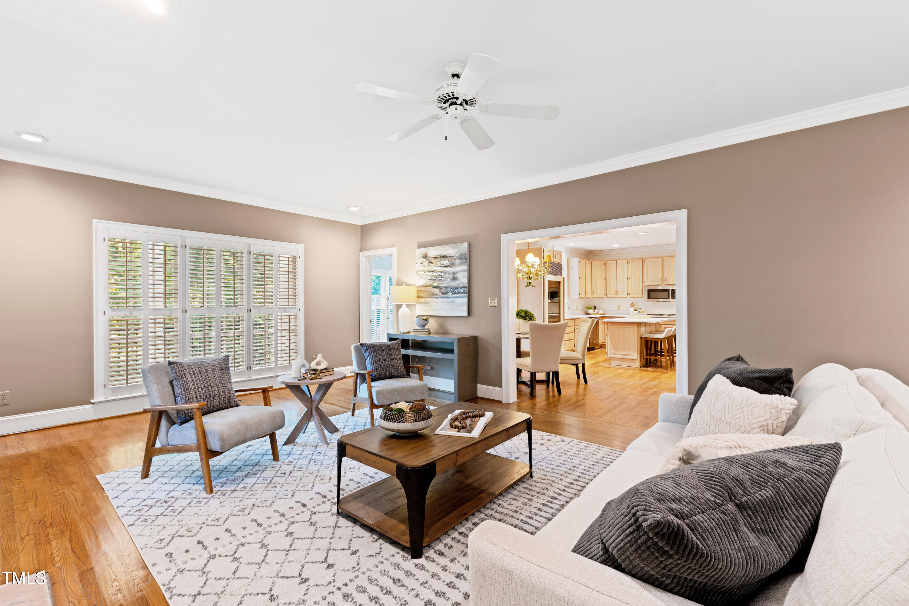 605 Chalfant Court Raleigh, NC 27607 - Photo 12 of 37 a living room with furniture and a large window