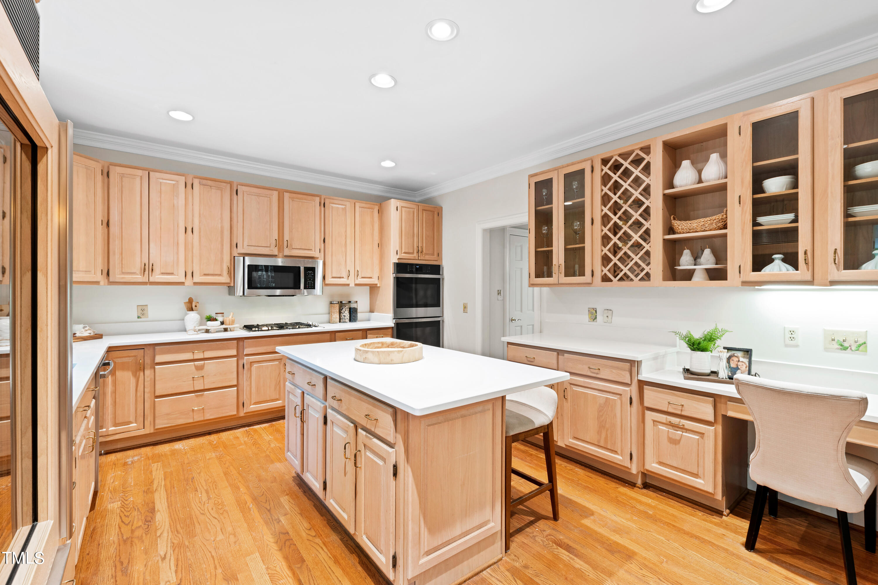 605 Chalfant Court Raleigh, NC 27607 - Photo 14 of 37 a kitchen with a sink stove and cabinets