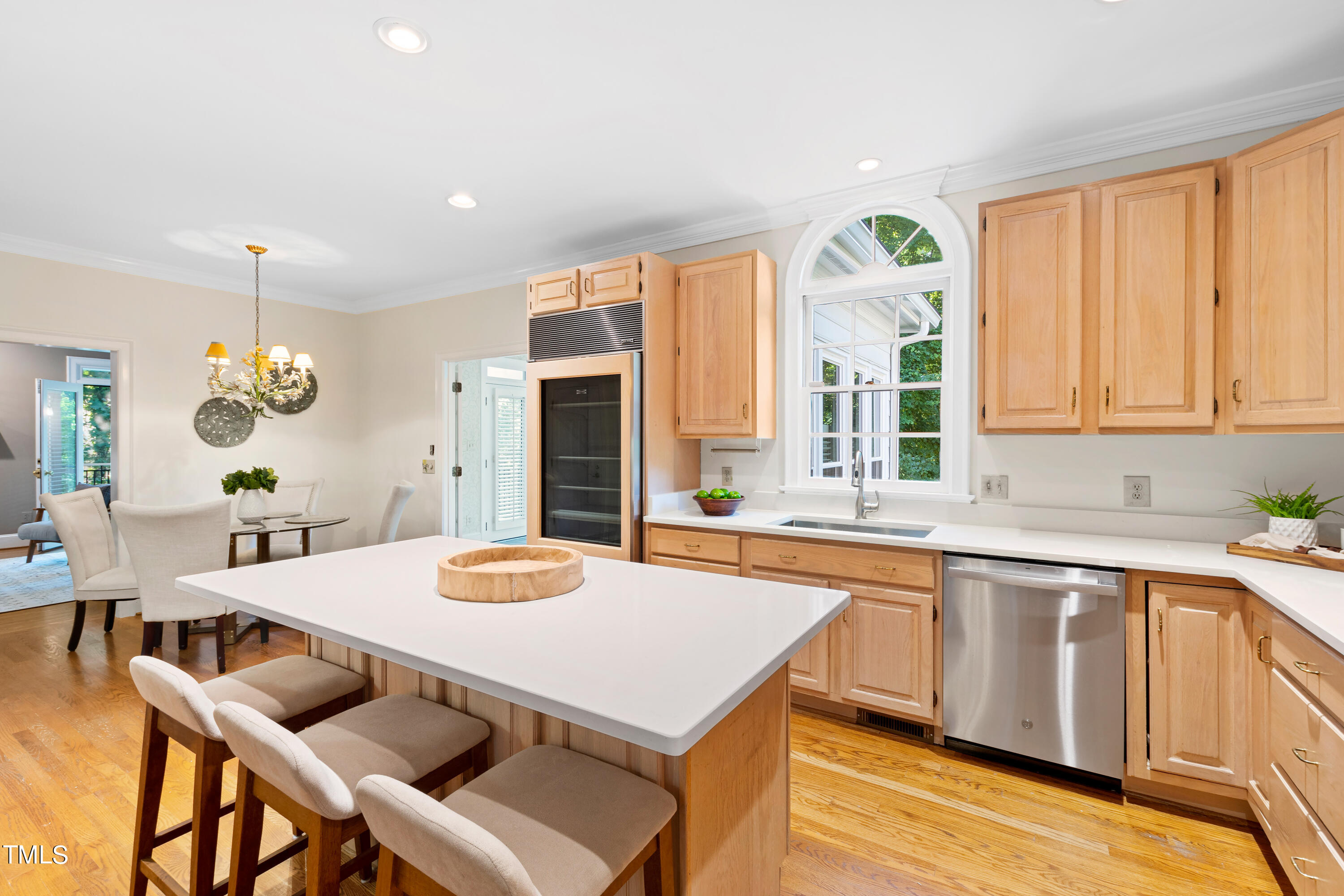 605 Chalfant Court Raleigh, NC 27607 - Photo 16 of 37 a large kitchen with a table and chairs in it