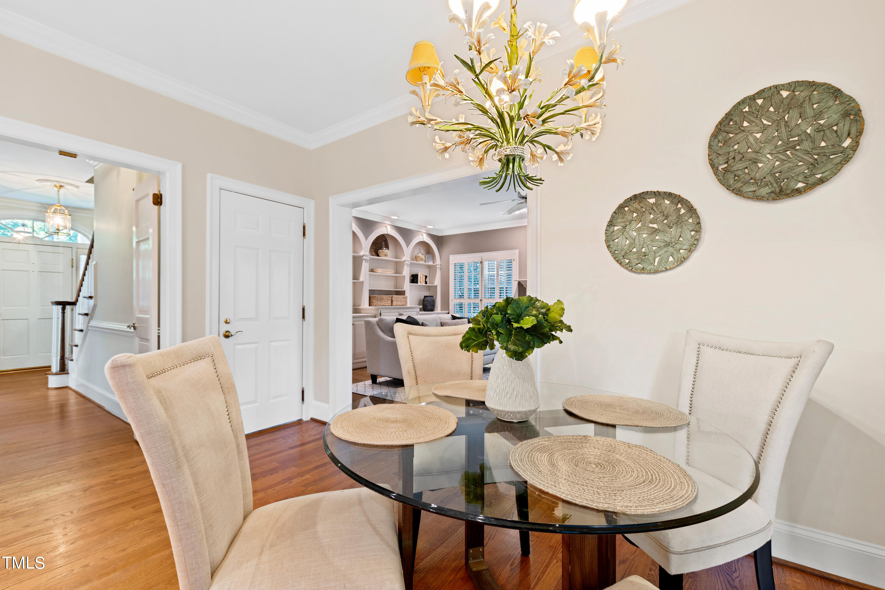 605 Chalfant Court Raleigh, NC 27607 - Photo 17 of 37 a view of a dining room with furniture and wooden floor
