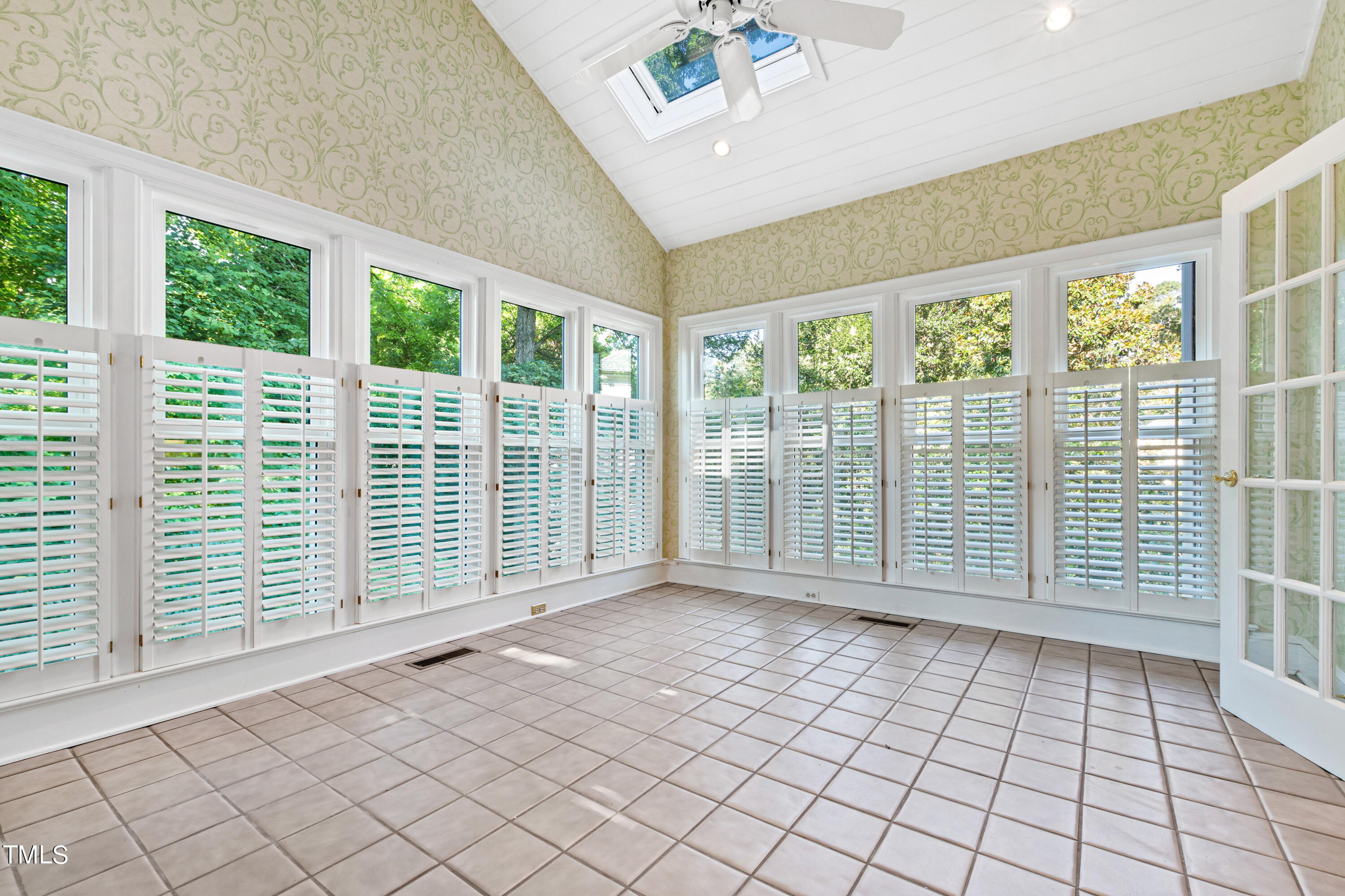605 Chalfant Court Raleigh, NC 27607 - Photo 19 of 37 a view of empty room with wooden floor and fan