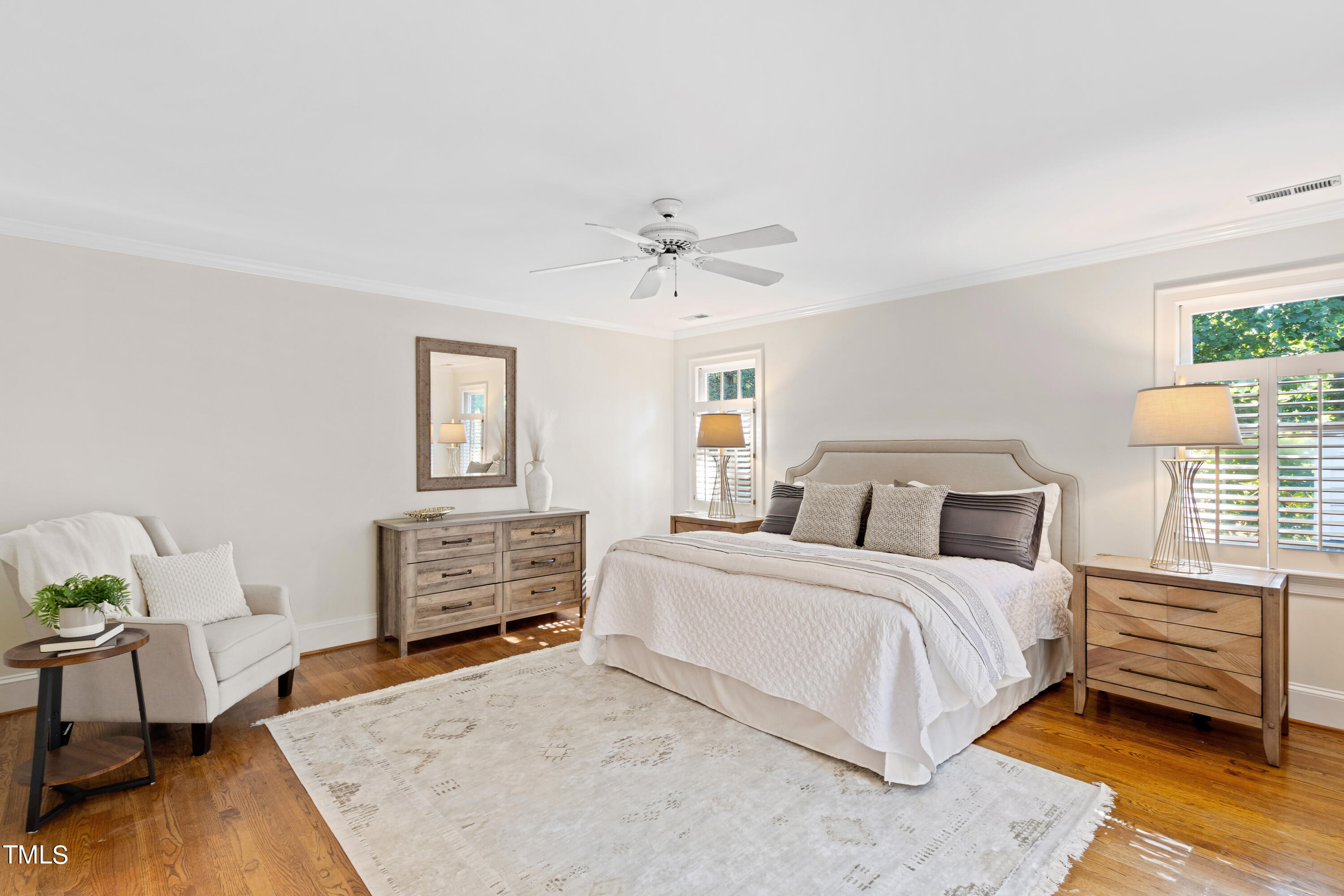 605 Chalfant Court Raleigh, NC 27607 - Photo 20 of 37 a bedroom with a bed and furniture