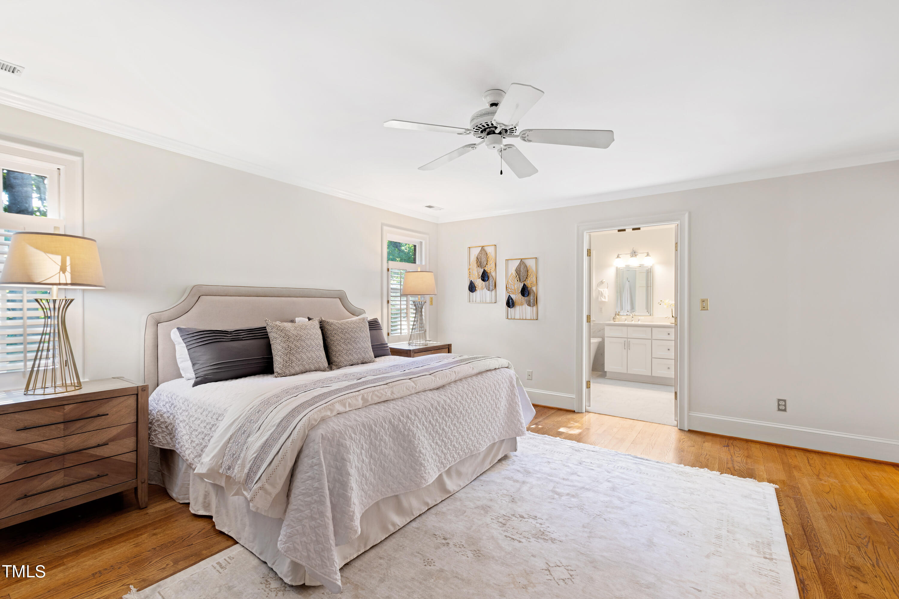 605 Chalfant Court Raleigh, NC 27607 - Photo 21 of 37 a spacious bedroom with a bed and closet