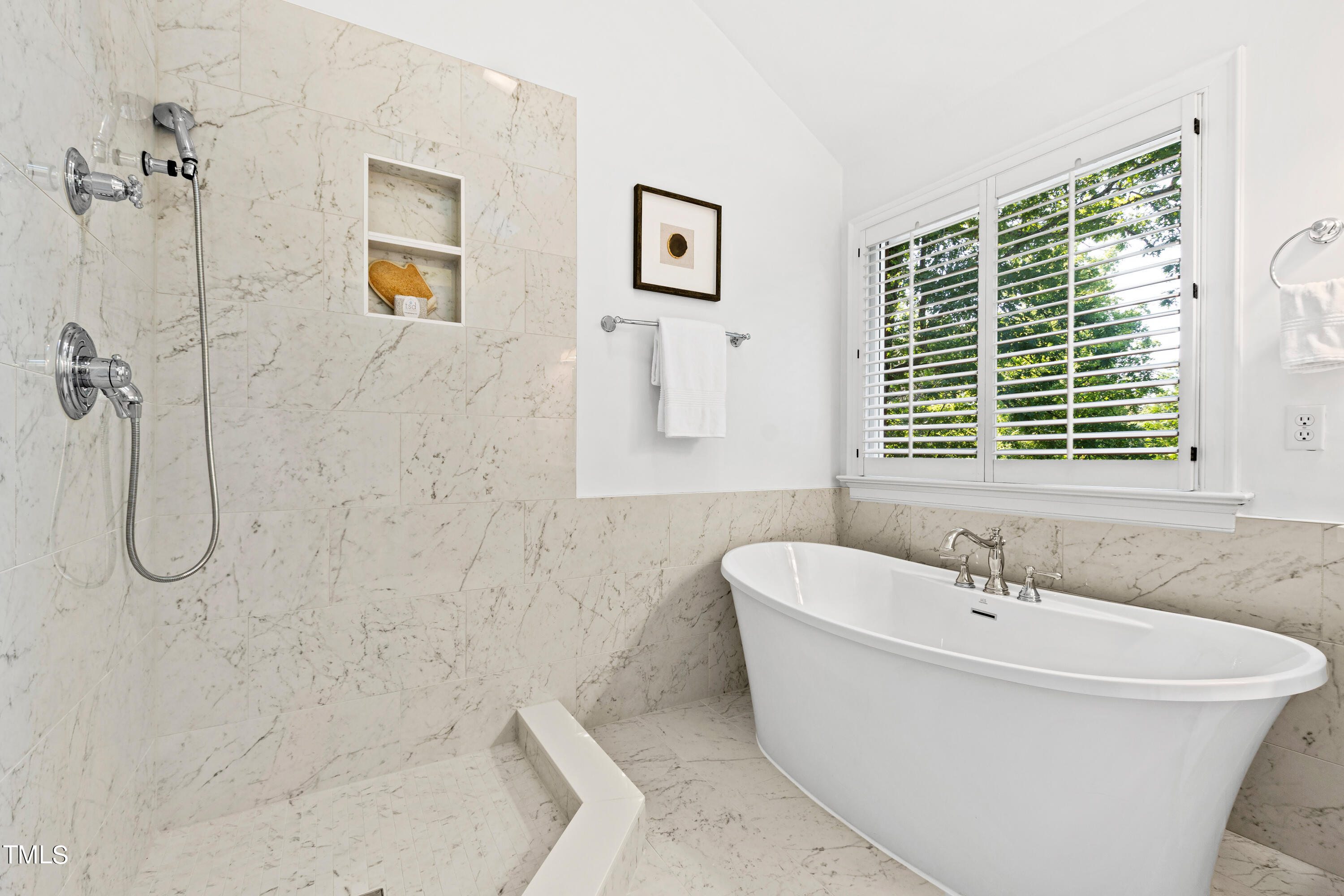 605 Chalfant Court Raleigh, NC 27607 - Photo 24 of 37 a bath tub sitting next to a window