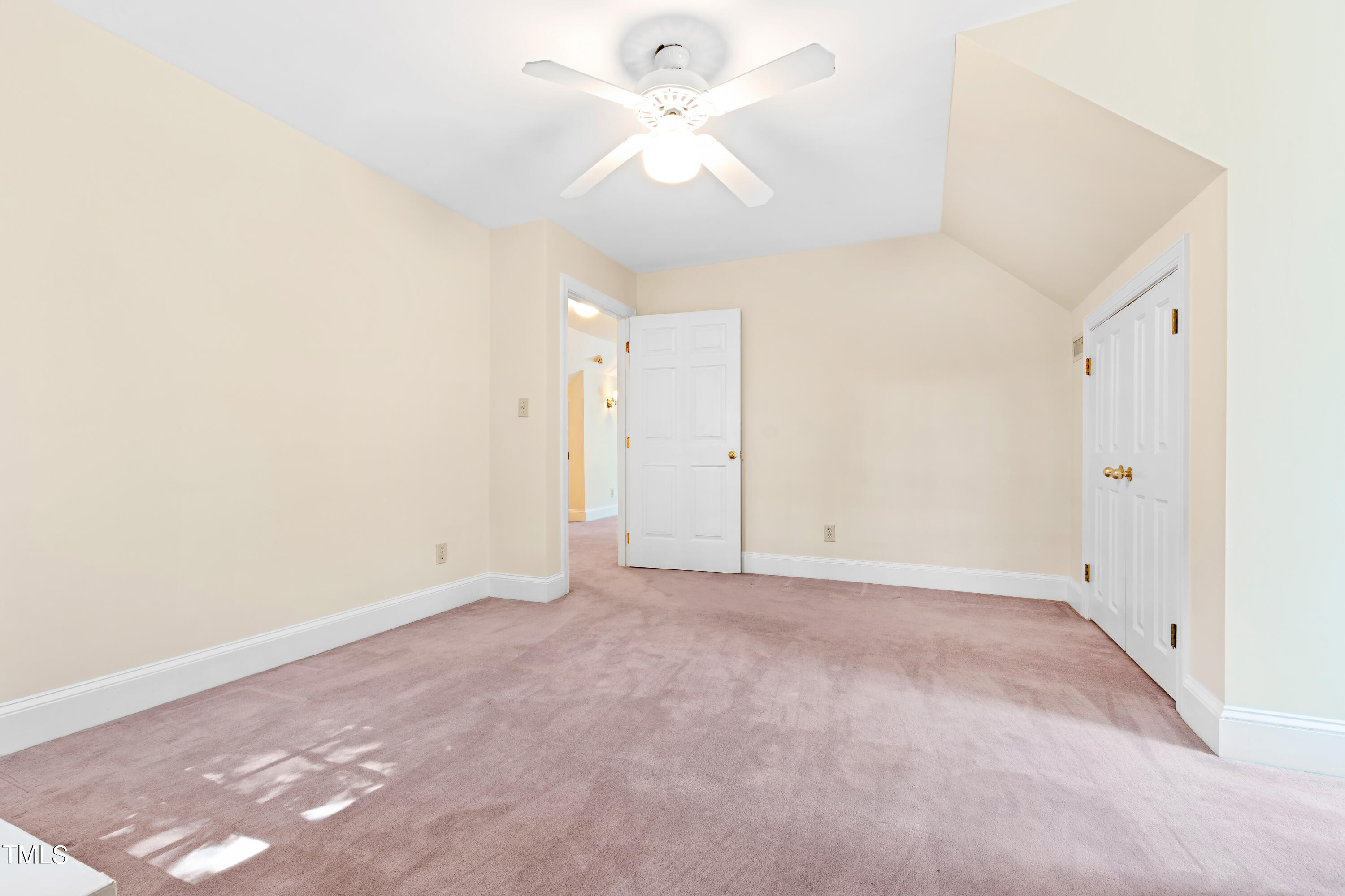 605 Chalfant Court Raleigh, NC 27607 - Photo 30 of 37 an empty room with fan and a ceiling fan