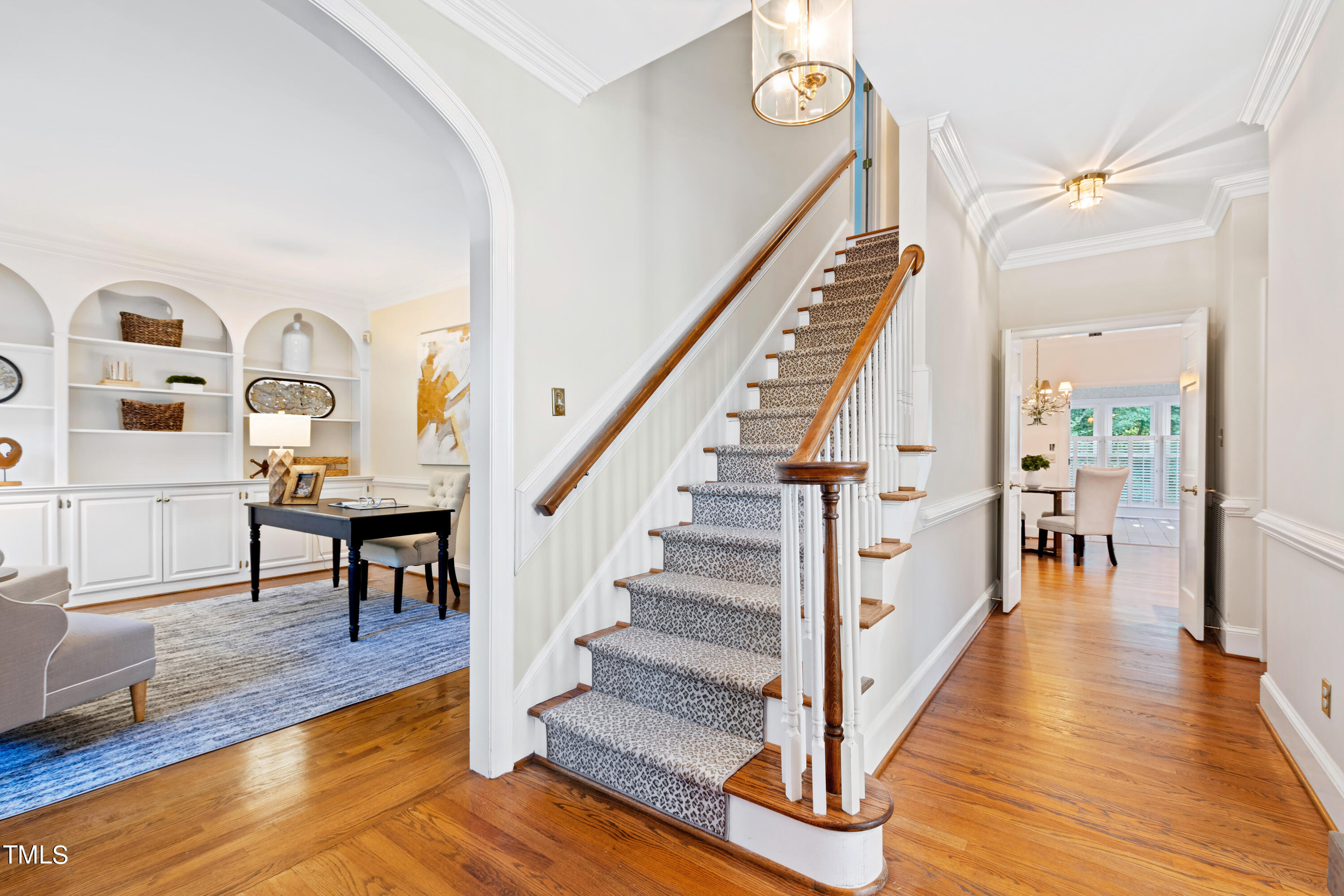 605 Chalfant Court Raleigh, NC 27607 - Photo 4 of 37 a view of entryway and hall with wooden floor