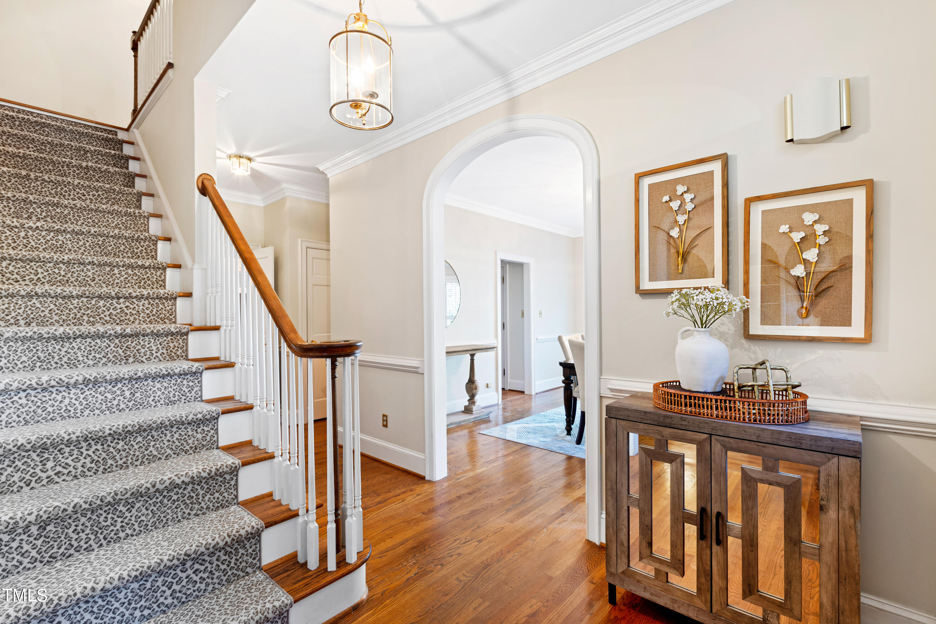 605 Chalfant Court Raleigh, NC 27607 - Photo 5 of 37 a view of entryway with wooden floor and front door