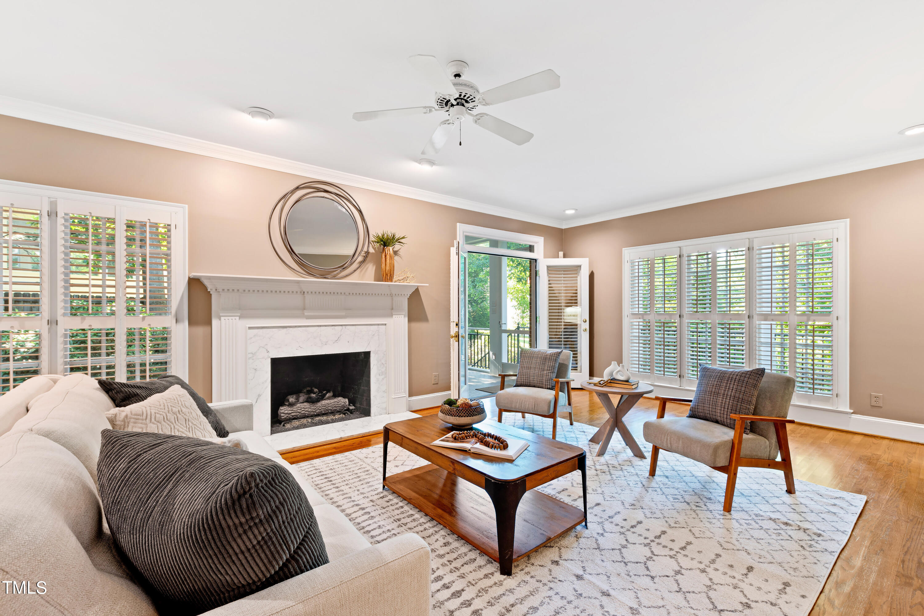 605 Chalfant Court Raleigh, NC 27607 - Photo 10 of 37 a living room with furniture and a fireplace