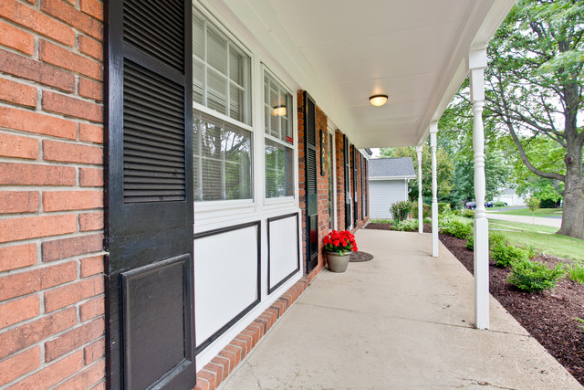 228 Timber Hill Road Buffalo Grove, IL 60089 - Photo 3 of 25 a building exterior with furniture