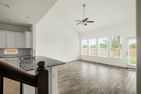 a view of entryway with wooden floor