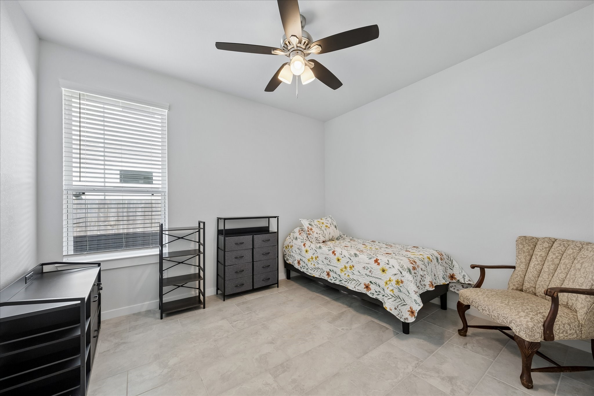 33002 Carolyns Perfection Loop Fulshear, TX 77441 - Photo 25 of 29 a bedroom with furniture and a ceiling fan