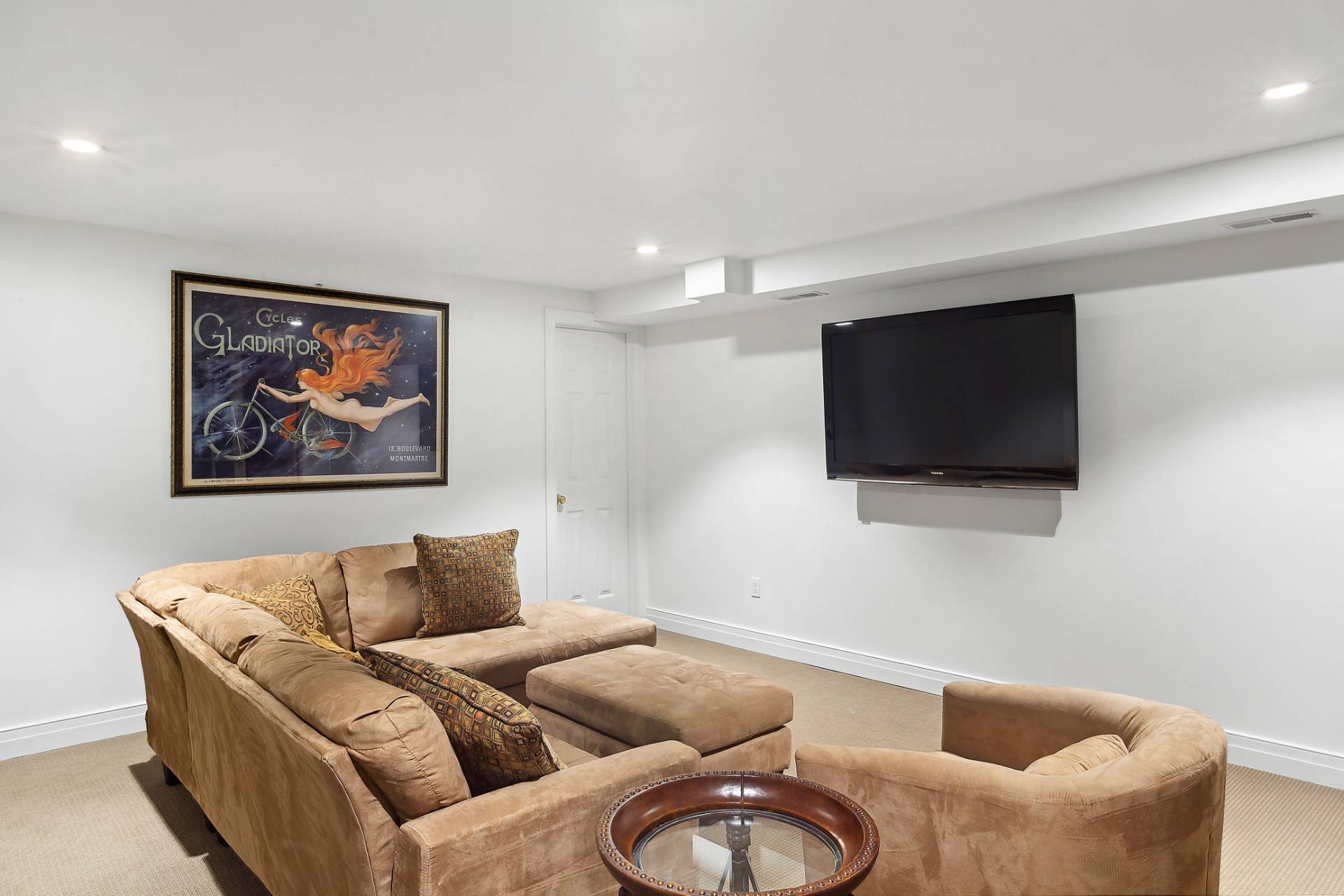 142 Bull Path East Hampton, NY 11937 - Photo 10 of 13 a living room with furniture and a flat screen tv
