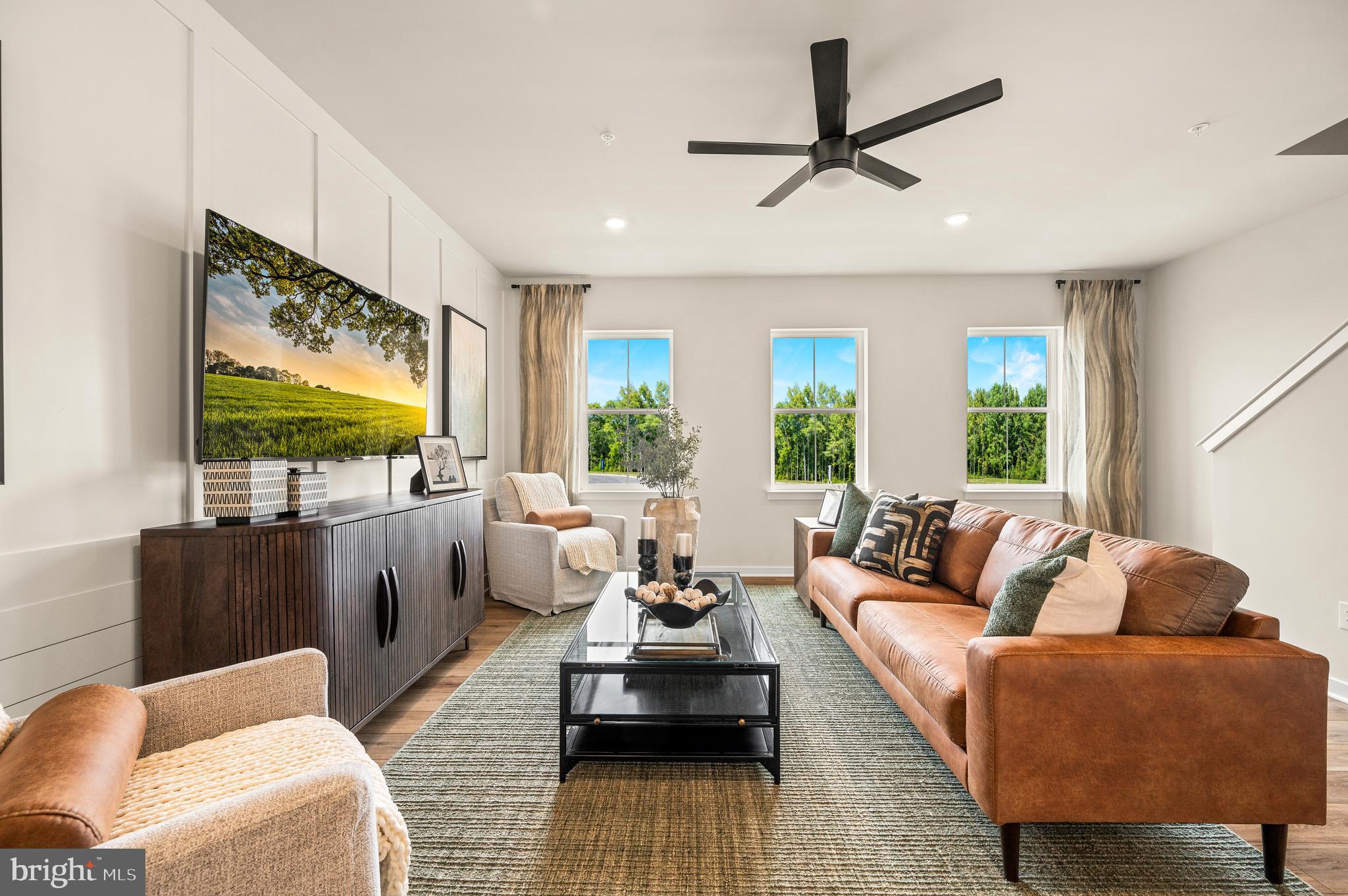 206 Bronze Street Phoenixville, PA 19460 - Photo 13 of 31 a living room with furniture and a flat screen tv