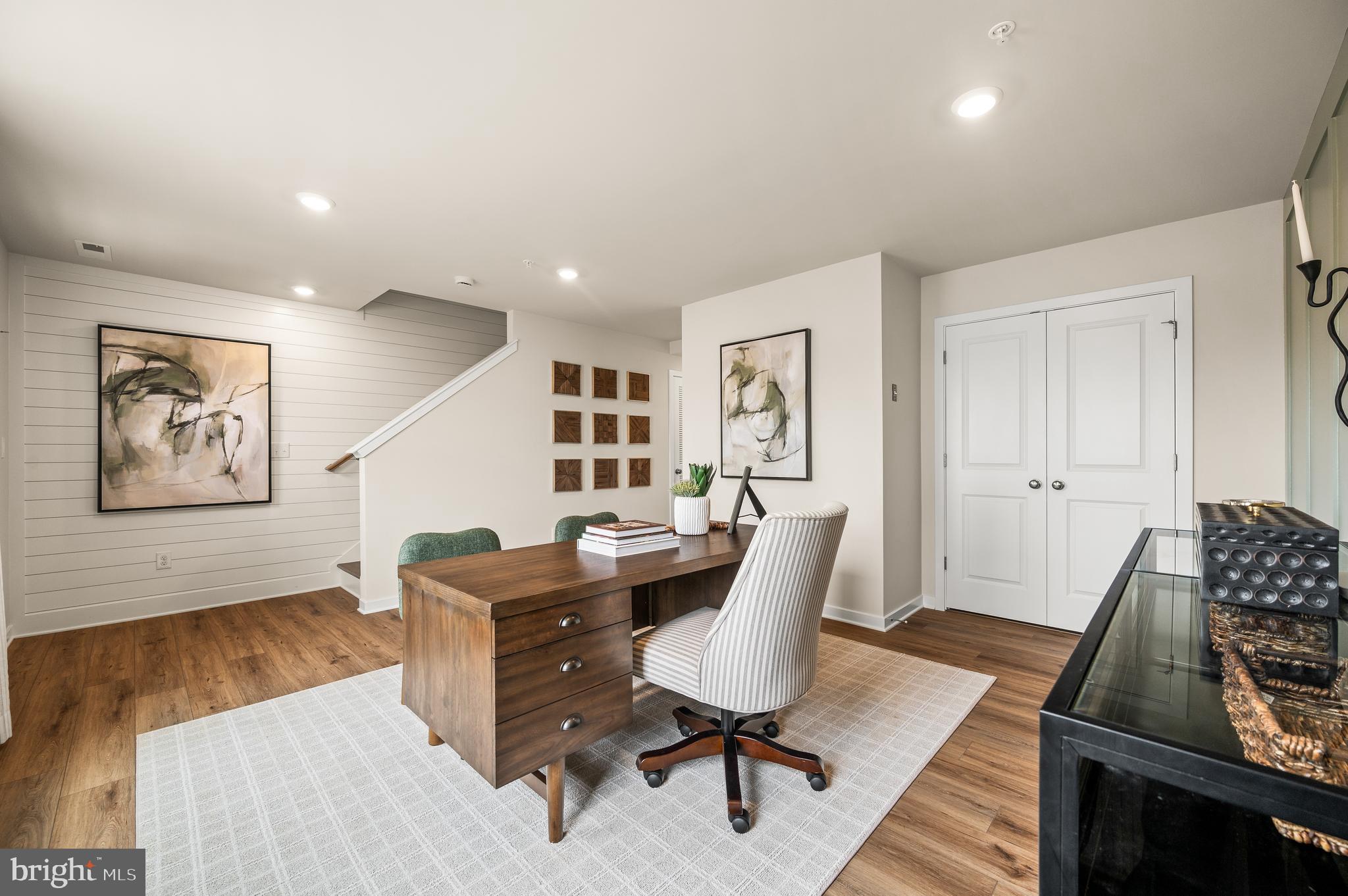 206 Bronze Street Phoenixville, PA 19460 - Photo 2 of 31 a workspace with furniture and window