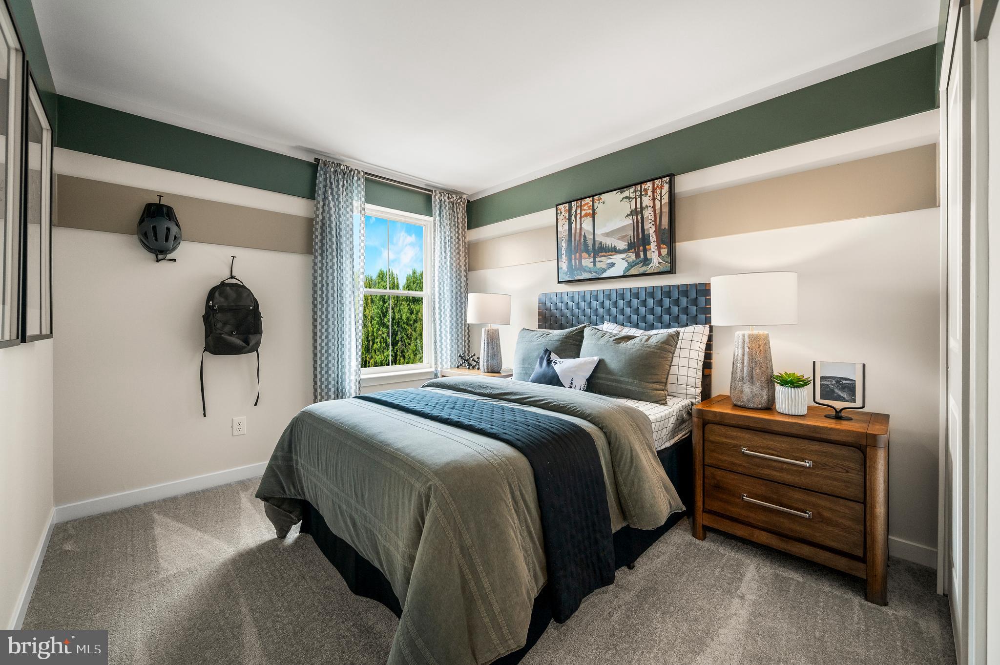 206 Bronze Street Phoenixville, PA 19460 - Photo 23 of 31 a bedroom with a bed and a window