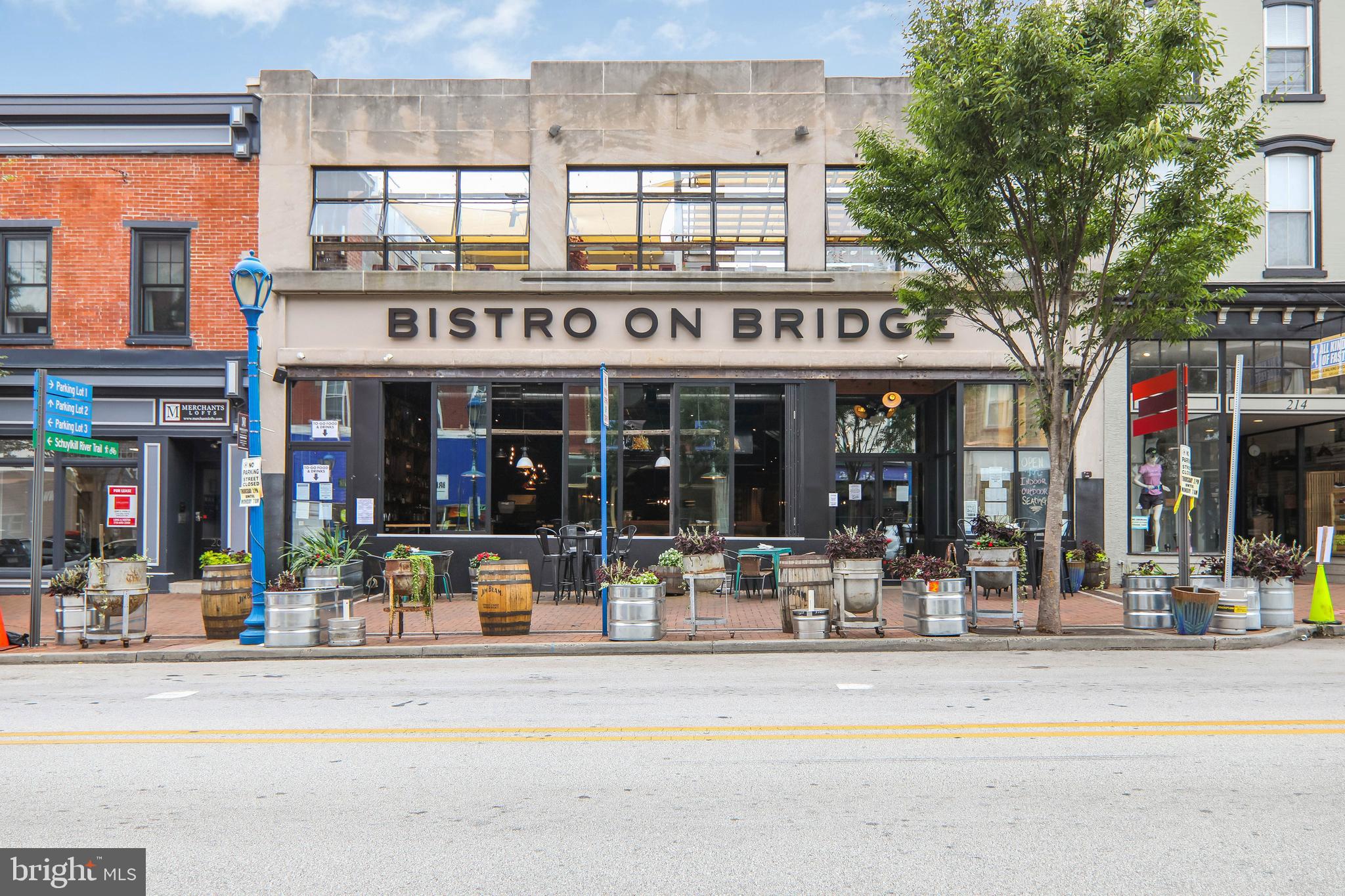 206 Bronze Street Phoenixville, PA 19460 - Photo 26 of 31 a view of a building with a large tree