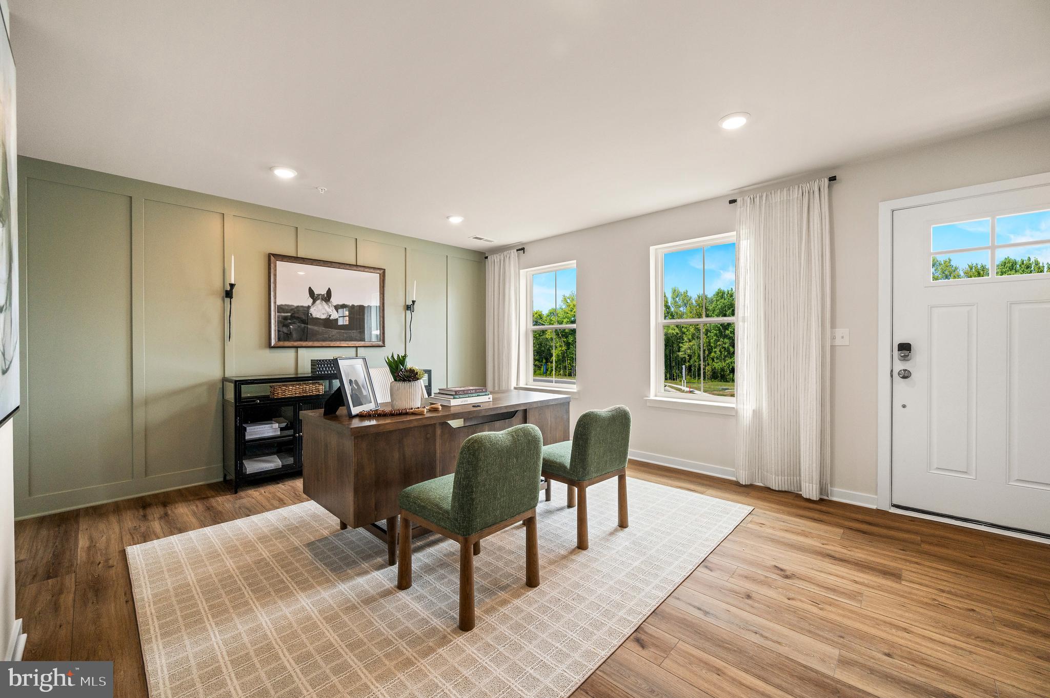 206 Bronze Street Phoenixville, PA 19460 - Photo 3 of 31 a view of a livingroom with furniture window and wooden floor