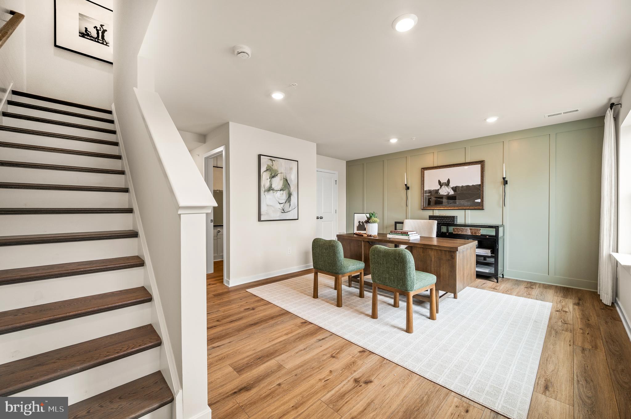 206 Bronze Street Phoenixville, PA 19460 - Photo 4 of 31 a view of a dining room with furniture and wooden floor