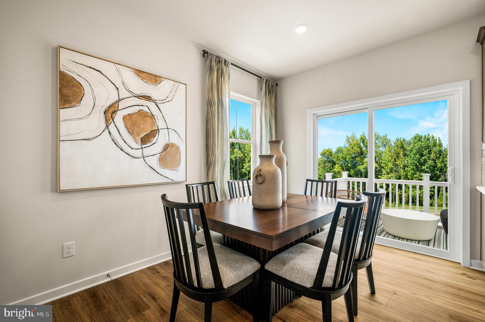 206 Bronze Street Phoenixville, PA 19460 - Photo 9 of 31 a dining room with furniture and wooden floor